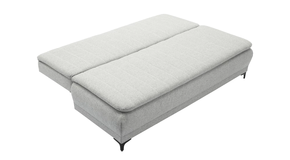 Szara sofa rozłożona.