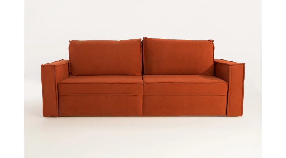 Sofa METIS w ceglastym kolorze.